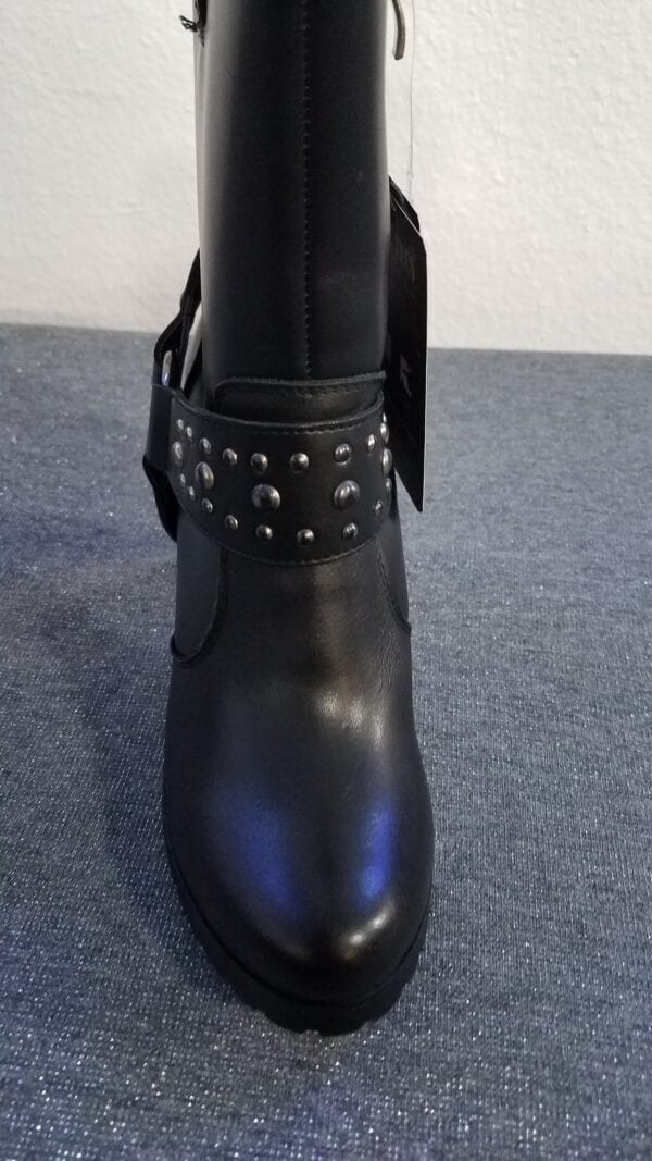 Front view black leather boot with buckle and tag