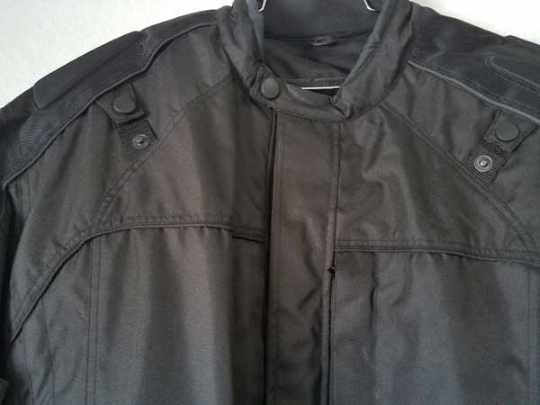 Black nylon vented jacket collar and torso