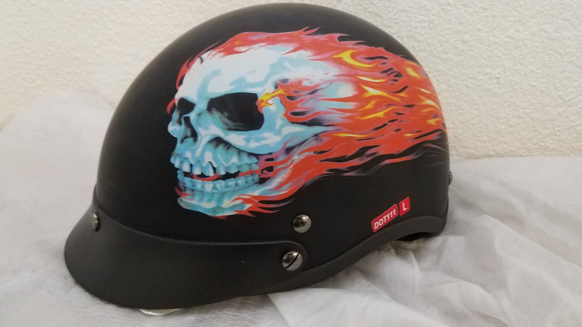 Black helmet with flaming skull decal