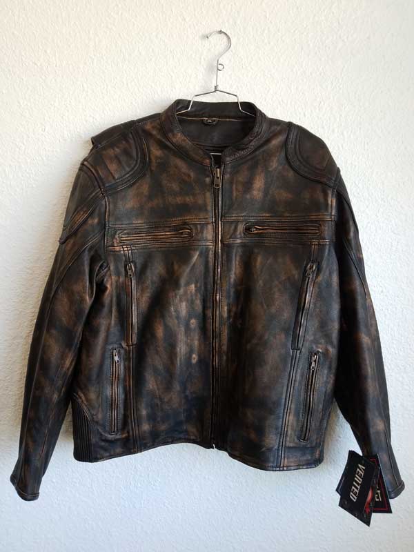 Brown faded biker jacket with gun