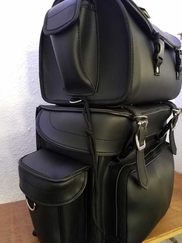 Three-Fourth view of black leather travel backpack