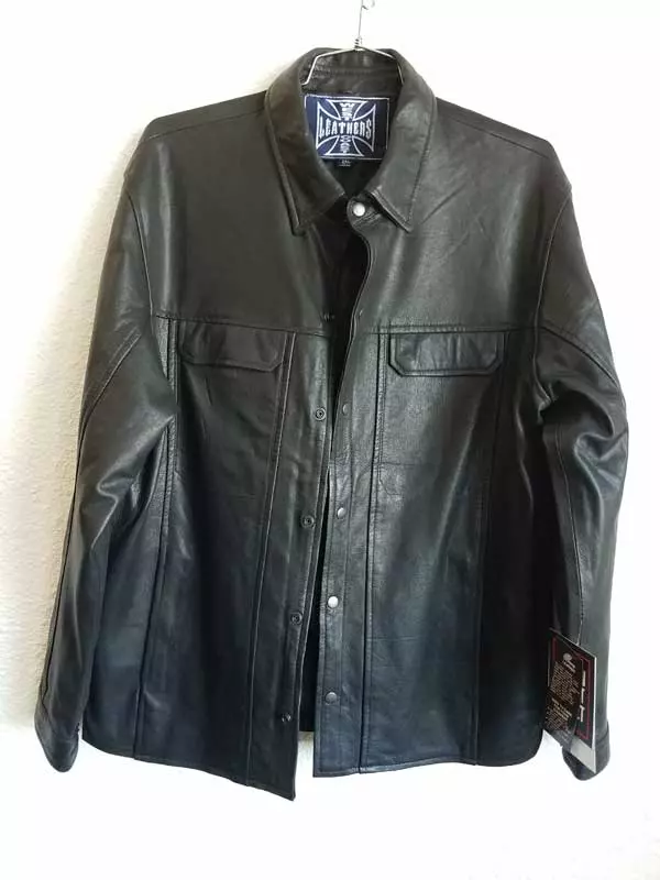 Man’s leather jacket with gun tag
