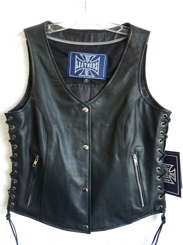 Women’s black vest with silver holes and zip pockets